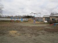 Детская площадка на ферме в поселке Полянный.